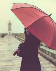The girl with the red umbrella